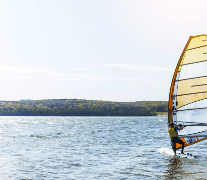 young-man-with-kitesurf-board